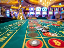 Live dealer pressing roulette wheel spin button during Lightning Roulette broadcast